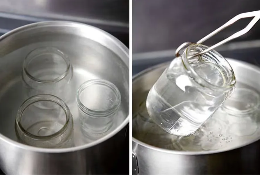 Hervido de los frascos Esterilización de frascos de vidrio en olla con agua hirviendo para asegurar conserva de changles.